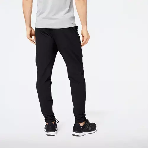 Spodnie New Balance Q SPEED JOGGER MP23287BK